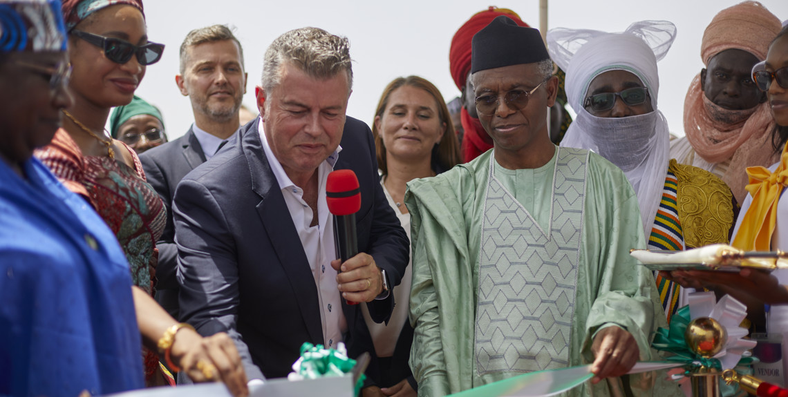 Simon Stevens (left), EVP and head of Arla's International business, officially opens the farm together with representatives from Nigeria