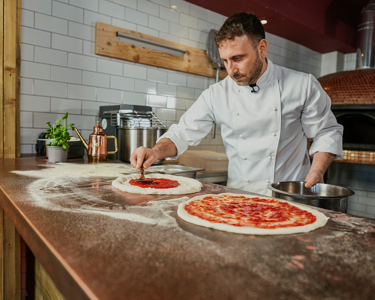 Portrait d'un champion de la pizza