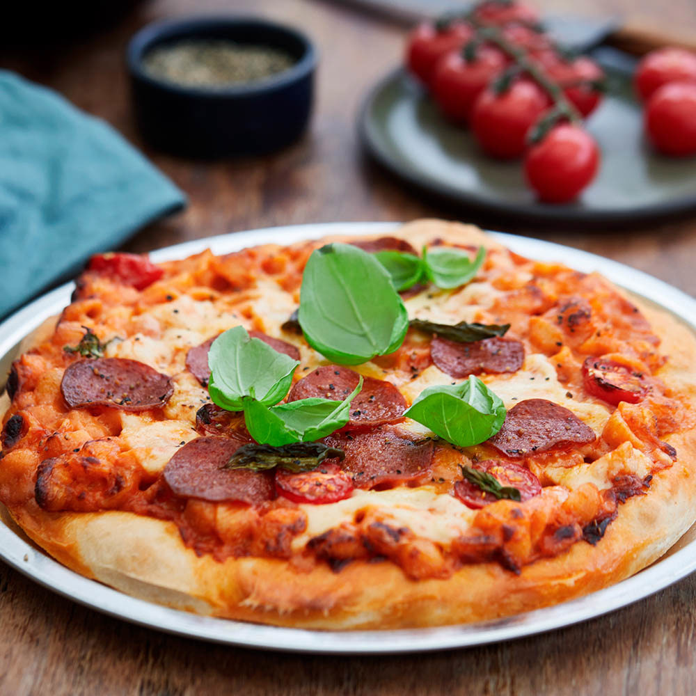 Macaroni and cheese pizza with Castello® Extra Mature Cheddar